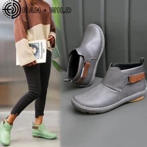 - - NWOT Women fashion leather sneaker ankle boots.